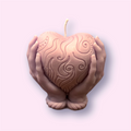 Heart in hands candle