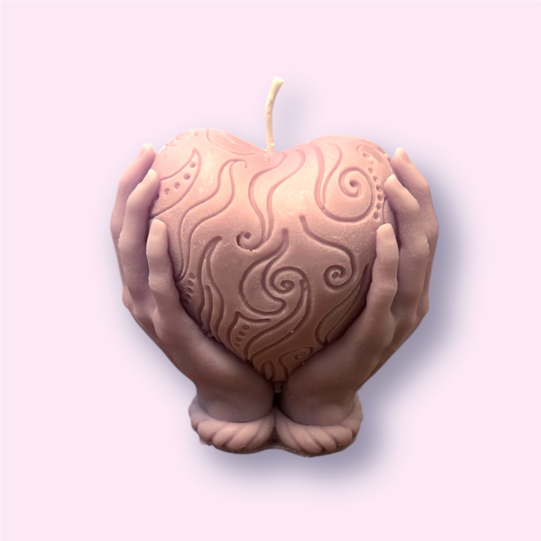 Heart in hands candle