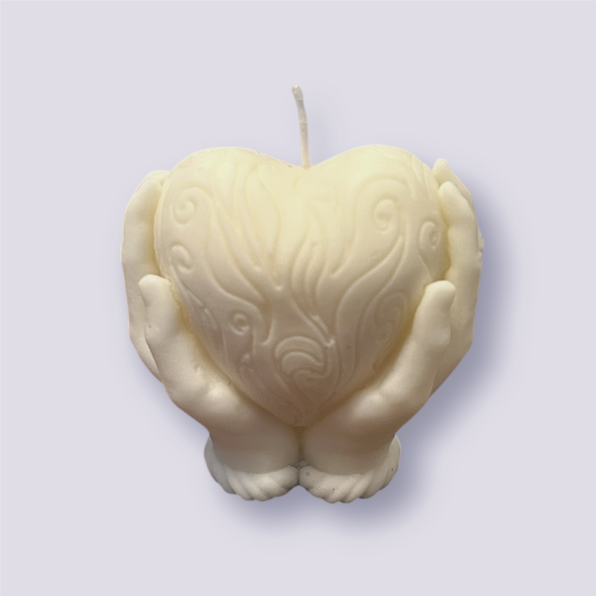 Heart in hands candle